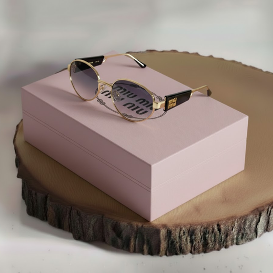 Gafas Miu Miu Gold